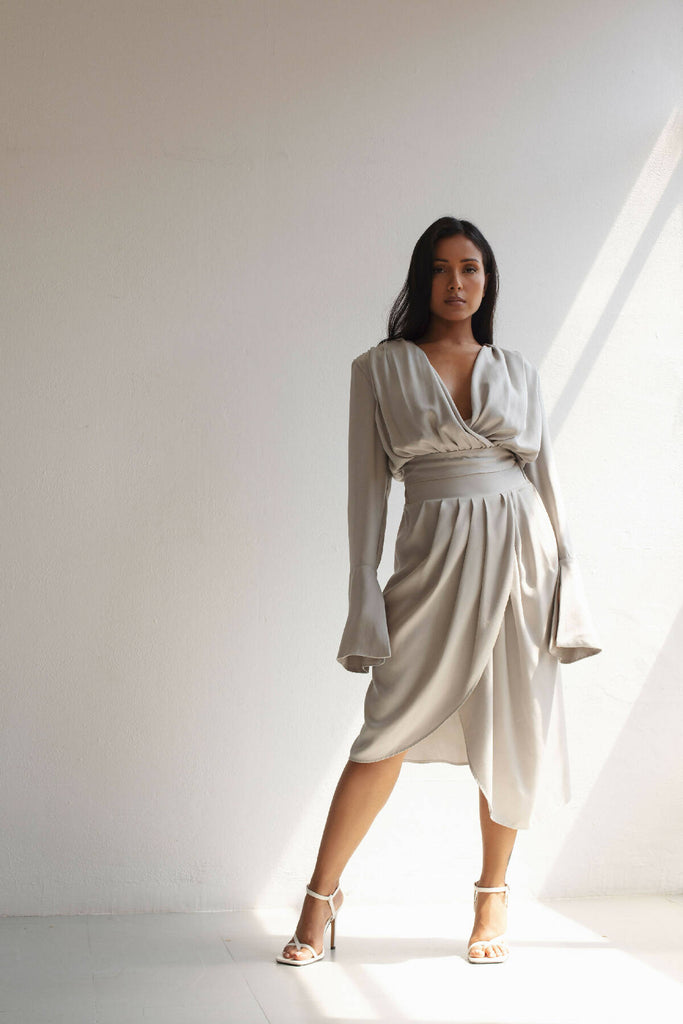 PLEATED SKIRT WITH ASYMMETRICAL OVERLAPPING